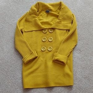 Mustard yellow sweater.